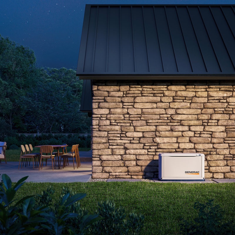 Generac Home Standby Generator Next To House At Night