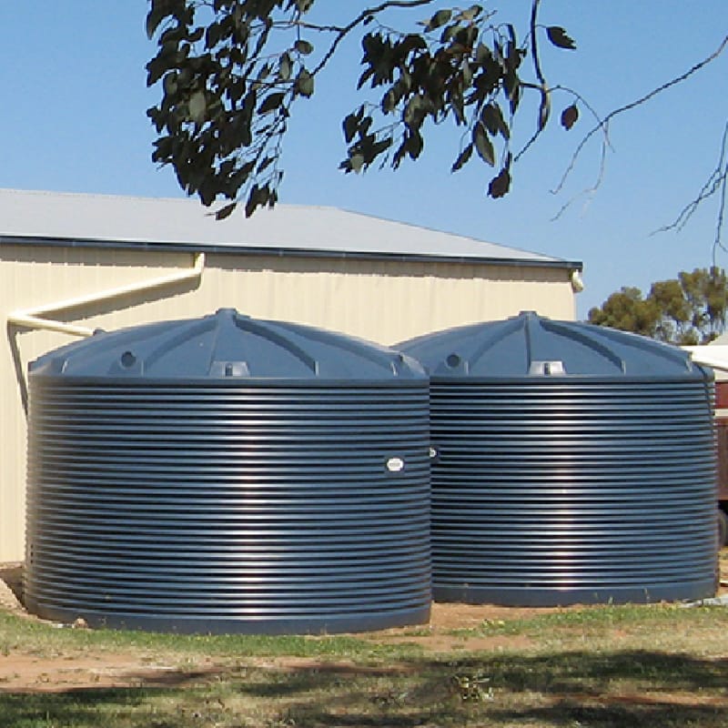 Two Polymaster 22500L Round Rainwater Tanks in Blue